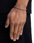 Model wearing 3mm white gold tennis bracelet by Iceman Society