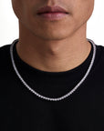 Model wearing 4mm white gold ice sparkler tennis chain set by Iceman Society, front view