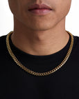 Model wearing 8mm 18K gold plain cuban chain set by Iceman Society, front view