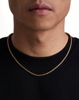 Model wearing 3mm 18k gold rope necklace by Iceman Society, front view