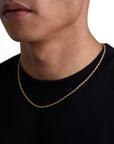 Model wearing 3mm 18k gold rope necklace by Iceman Society, side view