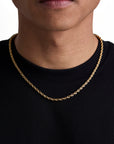 Model wearing 4mm 18k gold rope necklace by Iceman Society, front view