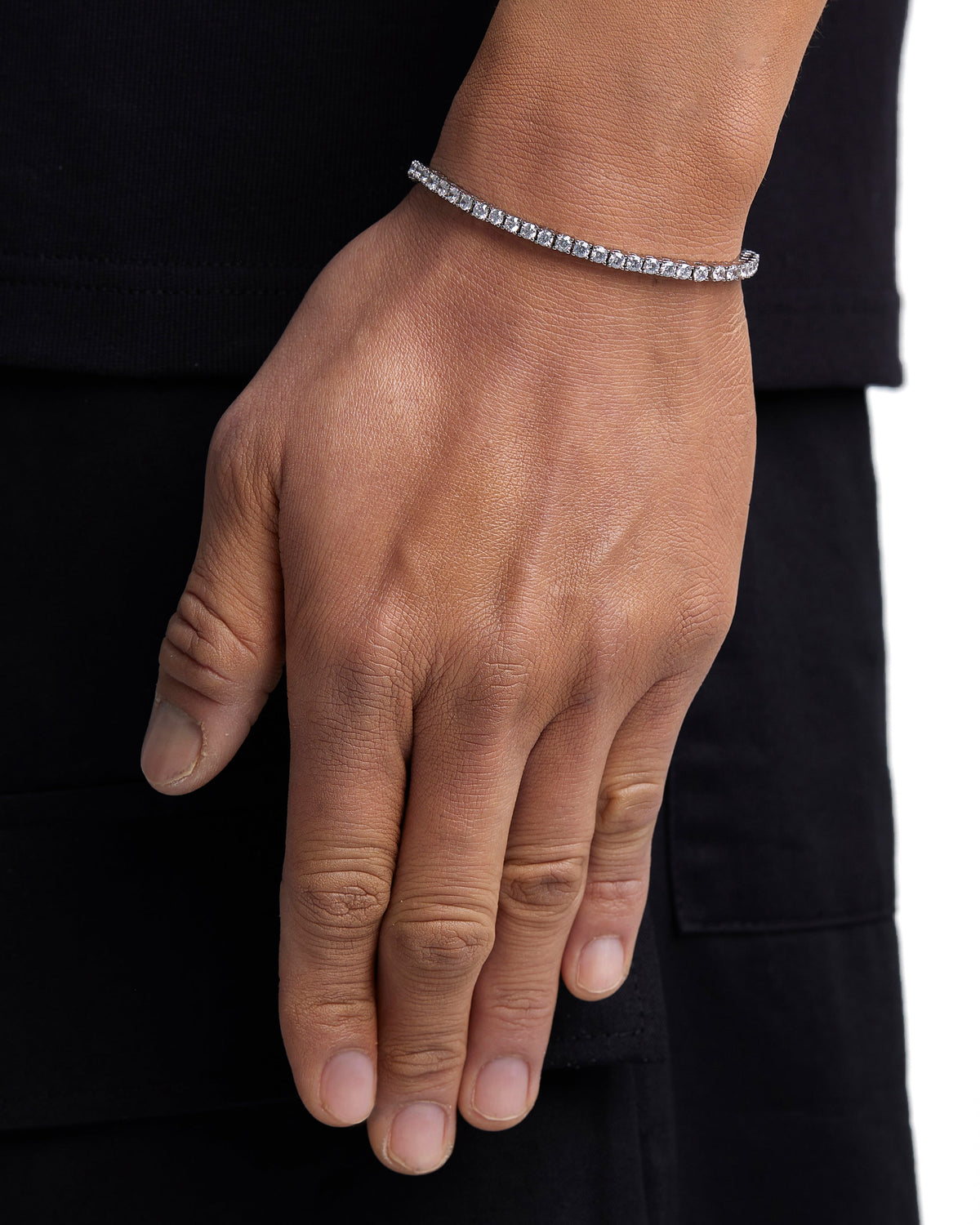Model wearing 3mm white gold ice sparkler tennis chain set by Iceman Society, side view