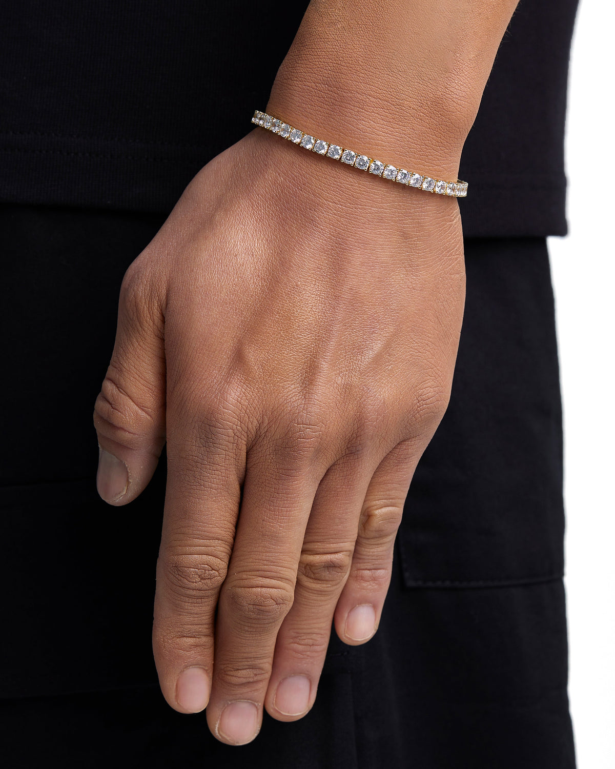 Model wearing 4mm 18K gold ice sparkler tennis chain set by Iceman Society, side view