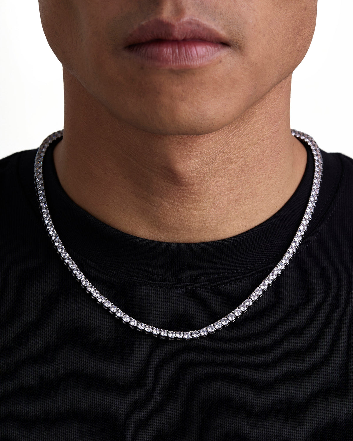 Model wearing 4mm white gold ice sparkler tennis chain set by Iceman Society, front view