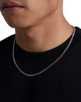 Model wearing 3mm white gold plain cuban necklace by Iceman Society, side view