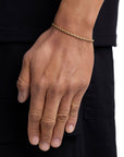 Model wearing 3mm 18k gold rope bracelet by Iceman Society