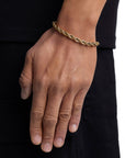 Model wearing 6mm 18k gold rope chain set by Iceman Society, side view